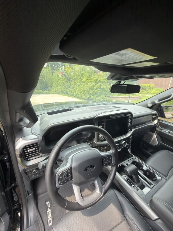 Ford F-150, wheel and console after detailing by Aero Detailing, South Lyon MI